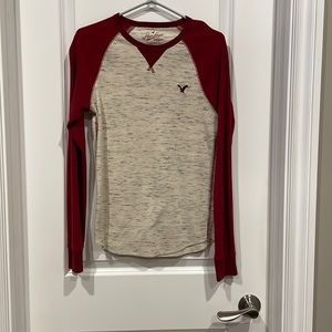 Men’s A and E knit shirt.